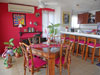 Dine with a wonderful view of the beach. Computer desk (wifi) and kitchen bar.