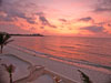 Enjoy morning coffee and bird song while watching the sunrise over the bay.